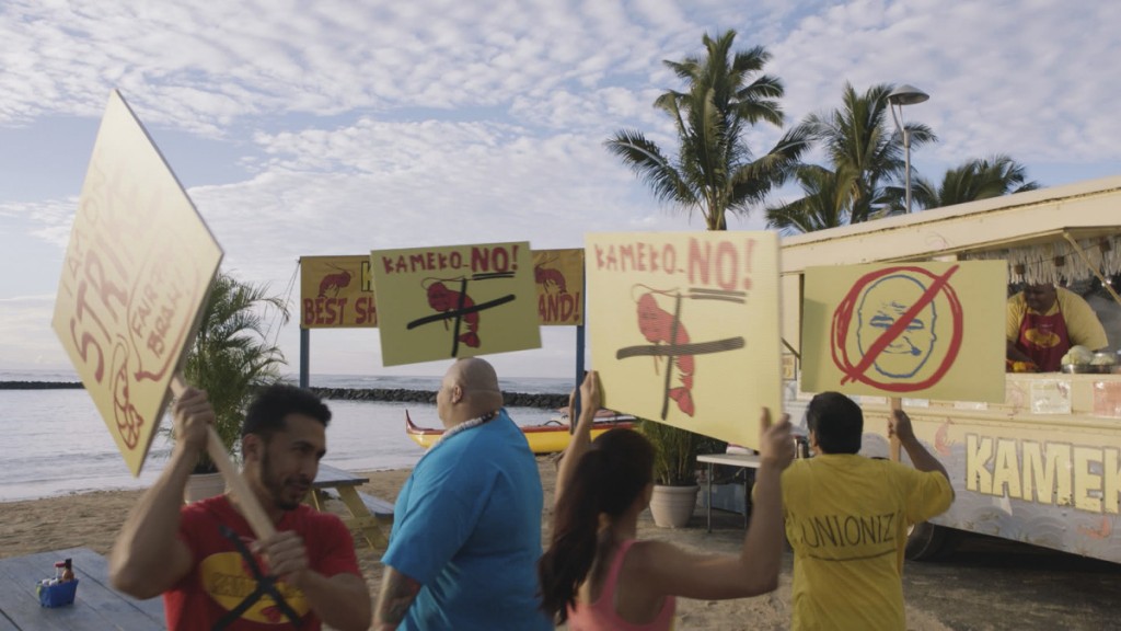 Une manifestation a lieu devant le camion de crevettes de Kamekona (Taylor Wily).